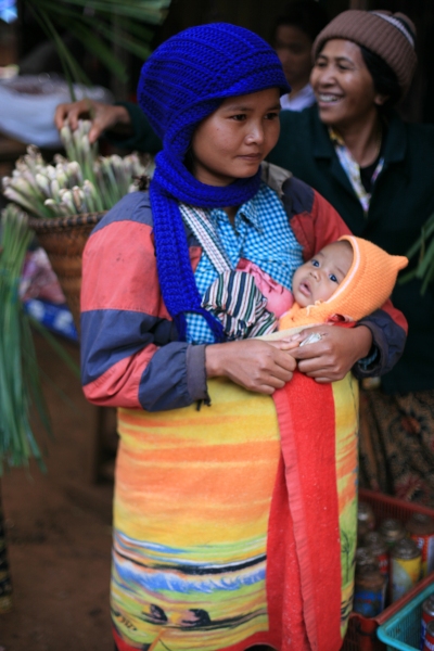 Phnong woman selling lemon grass